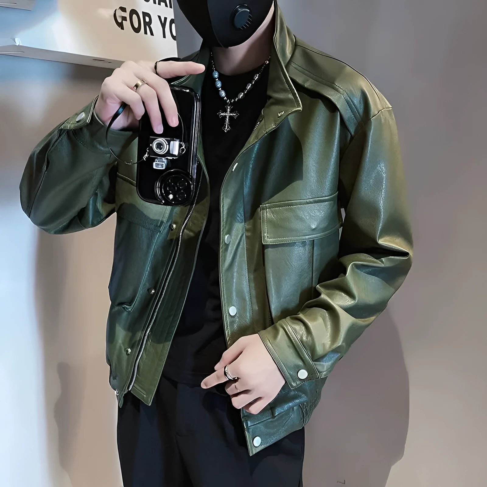 Men's black PU leather Korean-style pilot jacket with side pockets and straight hem.
