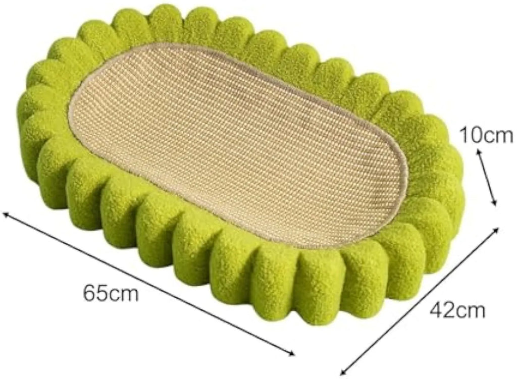 Green oval cardboard cat scratching pad with sisal surface, serving as a cat bed.