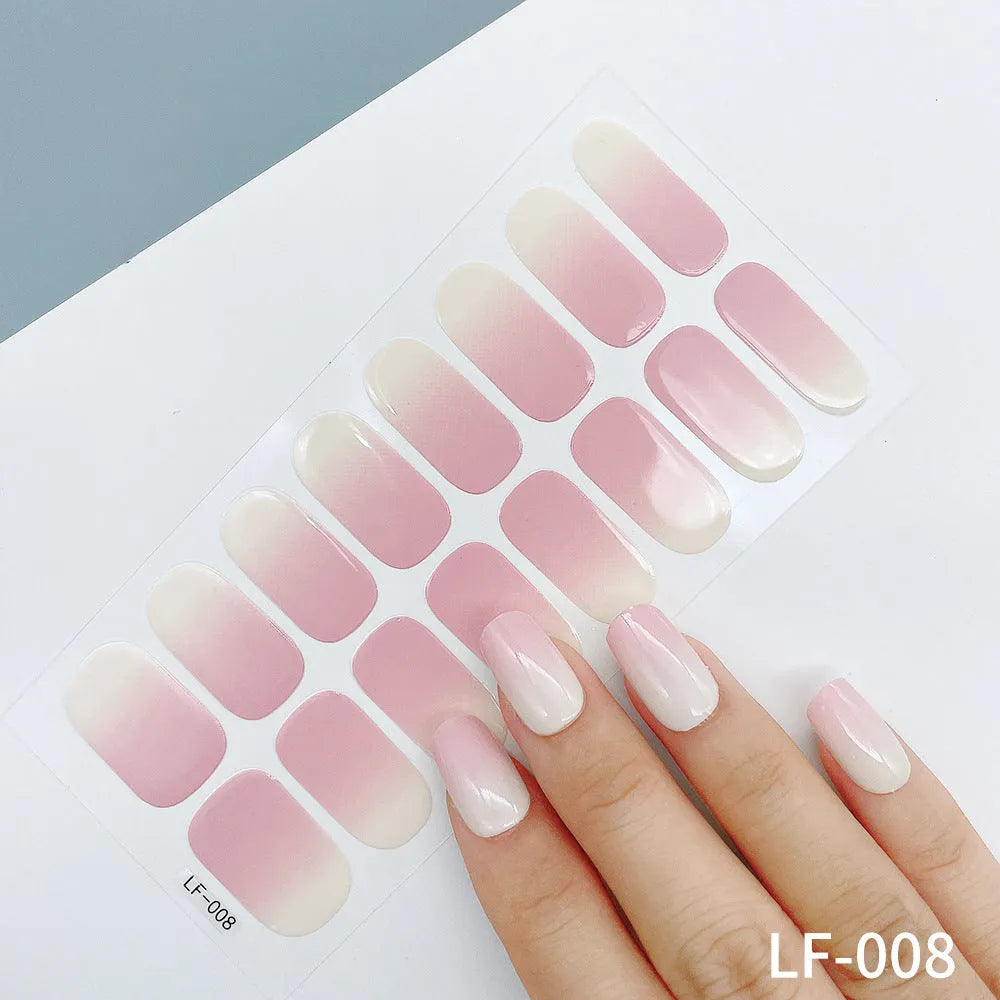 Full nail art sticker sheet showing 16 different solid colour designs including European simple nails and floral patterns