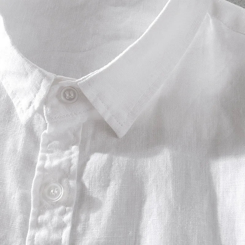 Men's loose fit short sleeve linen shirt in apricot colour on a hanger