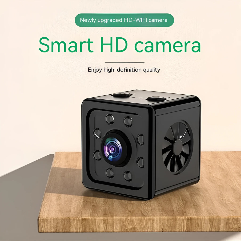 Black cubic K13 network sports camera with mounting bracket on a table