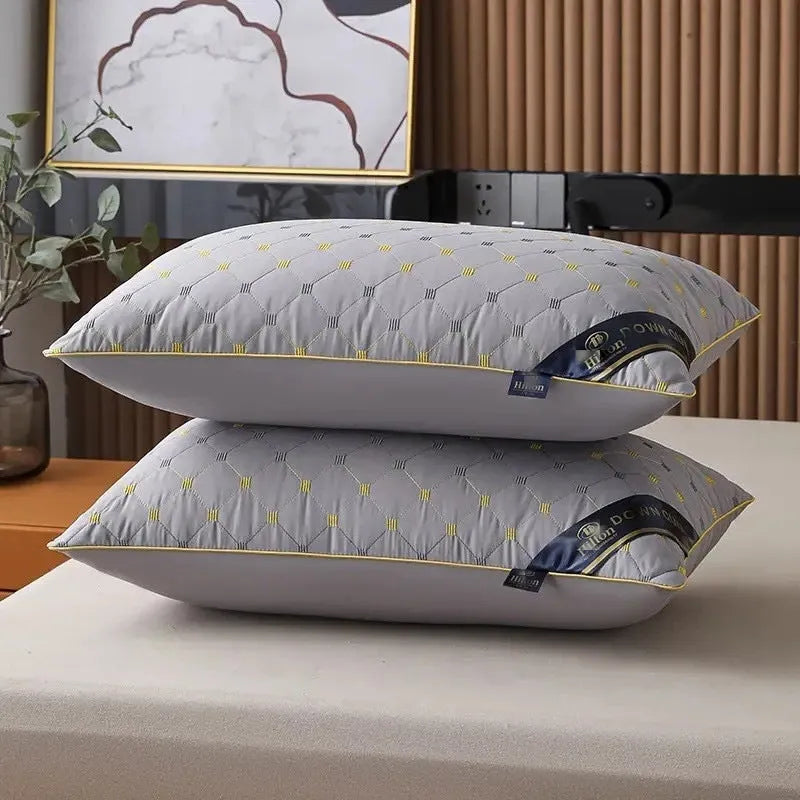 A standard 48x74cm polyester fibre filled pillow in a solid colour, shown on a bed.