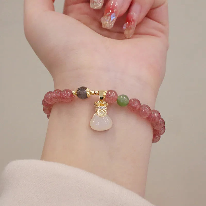 Geometric strawberry quartz and Hetian jade bracelet for women with a purse clasp.