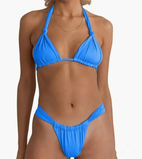 Women's pink bikini with knotted pleated straps and a briefs cut, shown on a model.