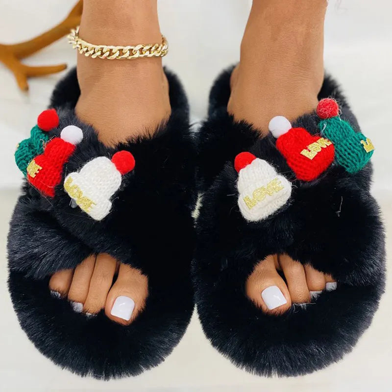 Women's faux plush slippers with a Christmas hat decoration on the upper, shown in available colours.