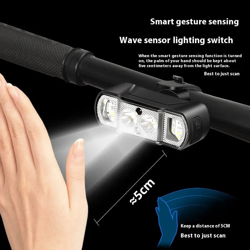 Black bicycle headlight with LED illumination mounted on handlebars
