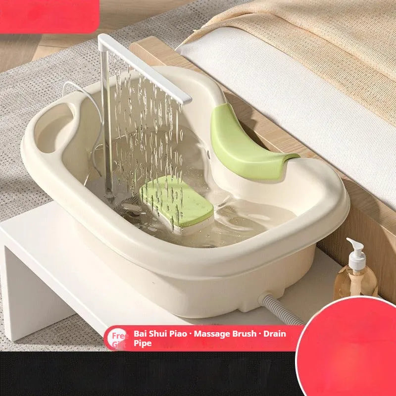 Light pink and beige plastic shampoo basin sets for bed use, showing adjustable neck pillow, water pump, and massage brush.