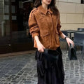 Women's brown suede-effect polyester coat with regular sleeves on hanger