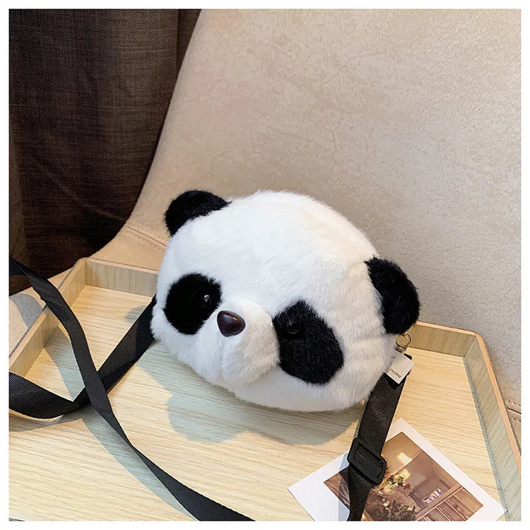 Plush panda head crossbody bag showing cylindrical shape and sandwich pocket organisation