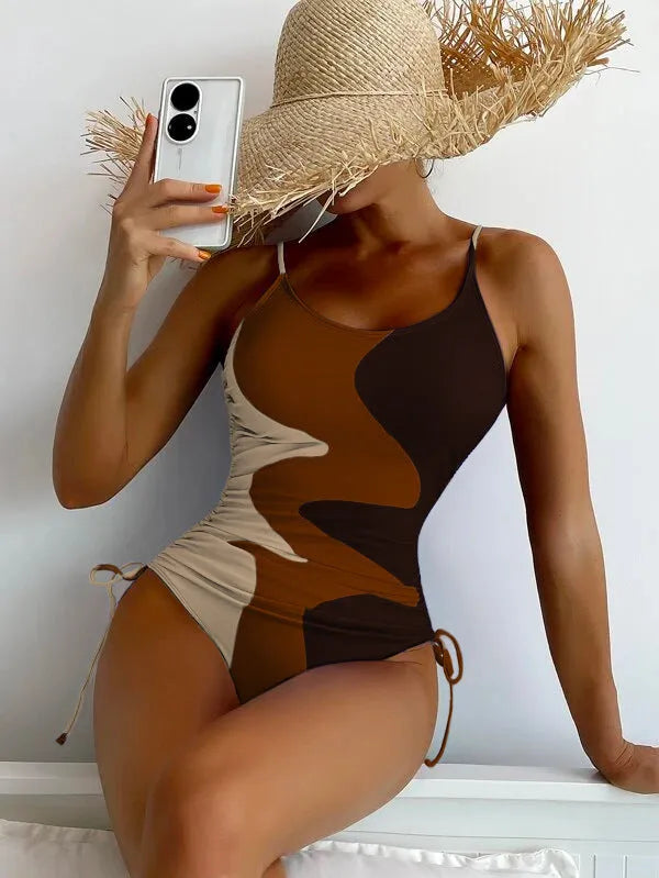Blue women's sleeveless one-piece swimsuit with fixed swimming trunks on a mannequin.