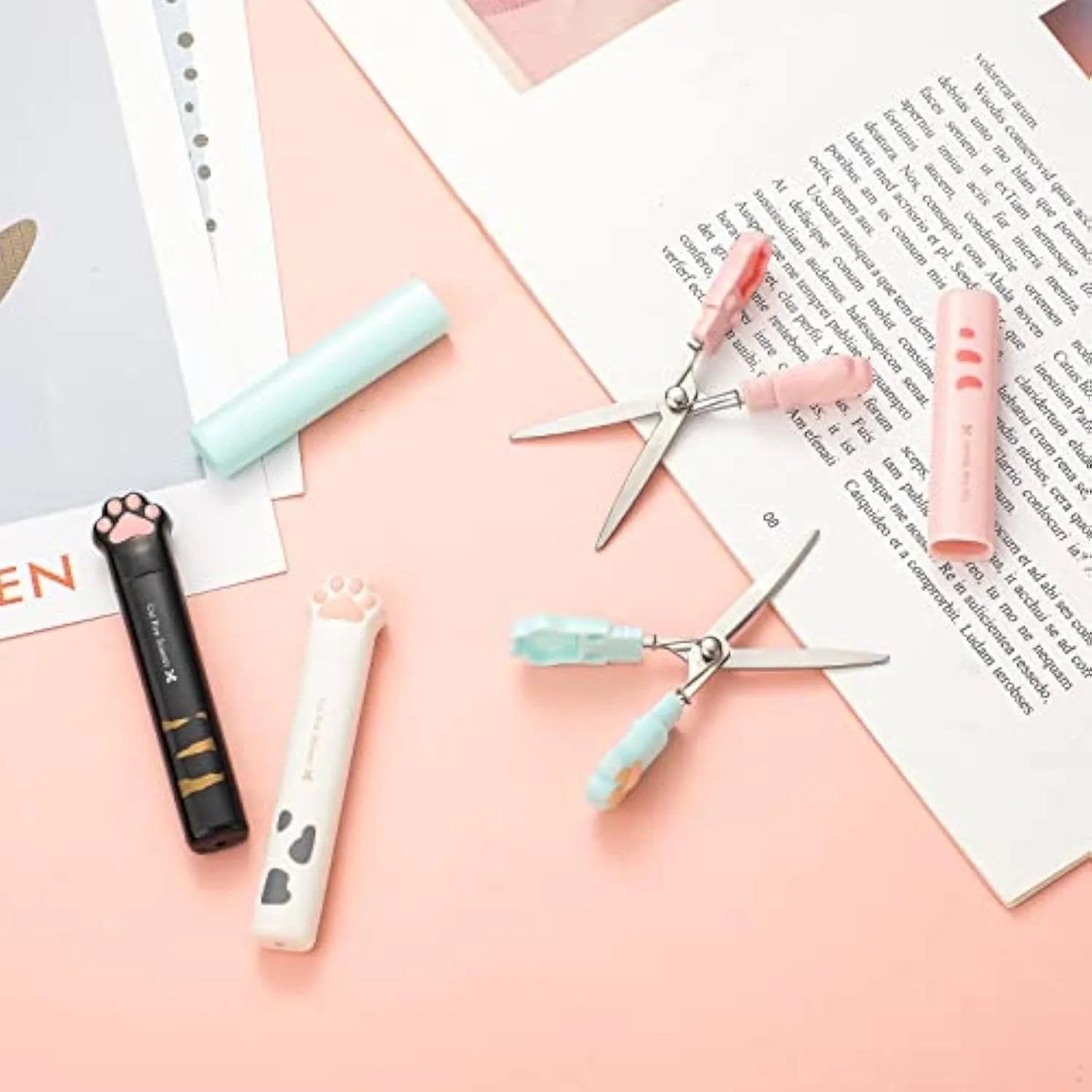 Cat paw mini folding scissors showing stainless steel construction and compact 8.7 cm size