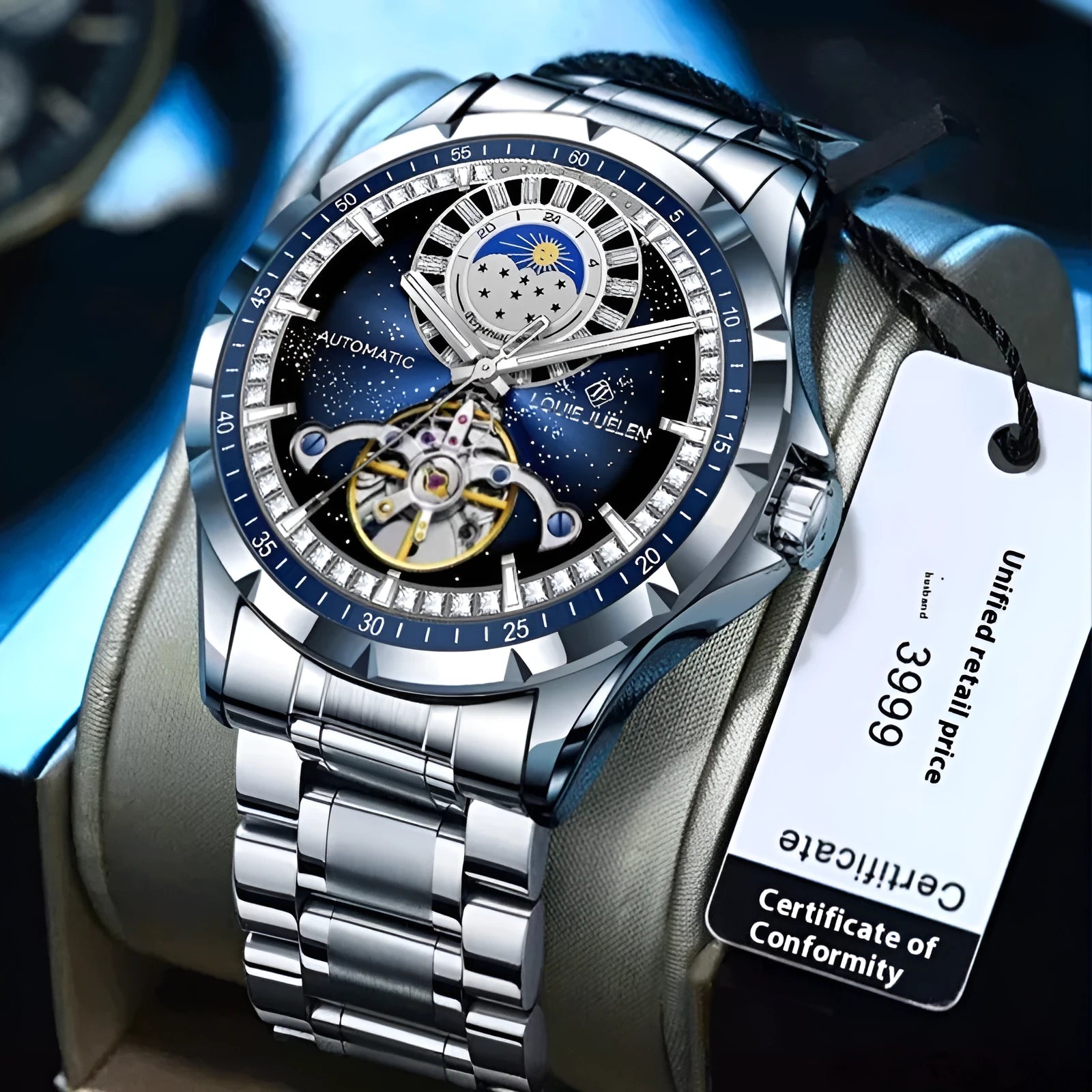 Men's silver automatic watch with blue dial and stainless steel strap showing transparent case back