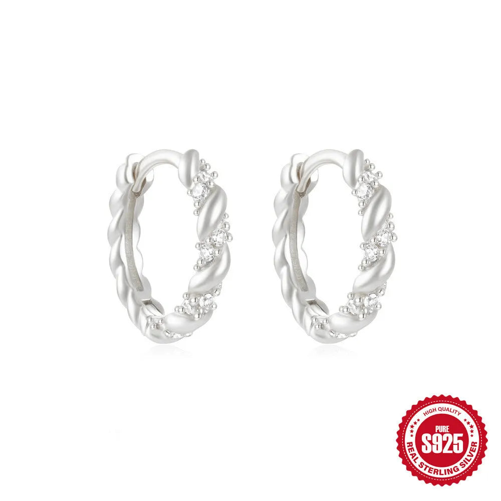 Sterling silver geometric stud earrings with diamond detailing in gold or silver finish