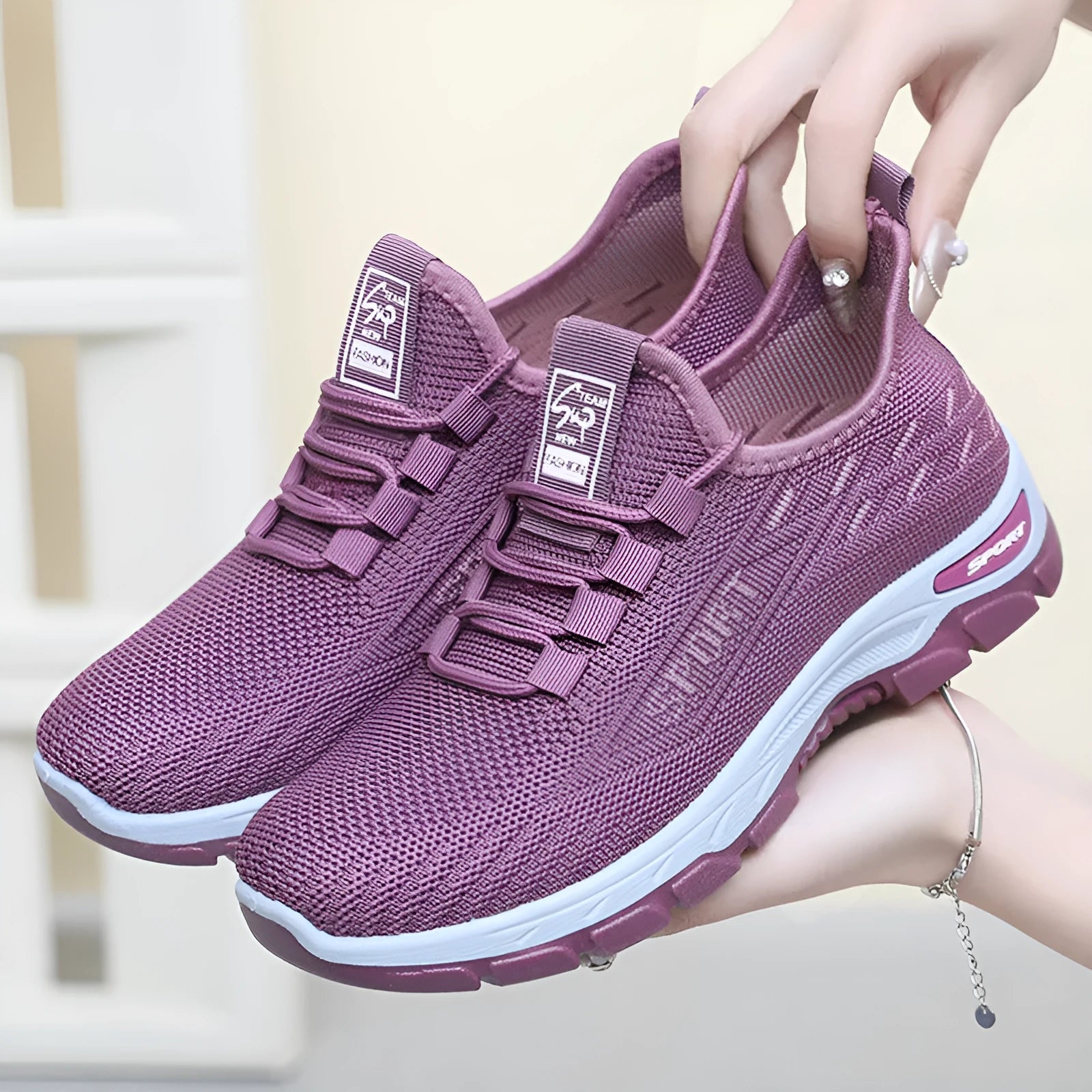 Men's and women's casual low-top sneakers with a soft PVC sole in black, red, light purple, grey, and brown.