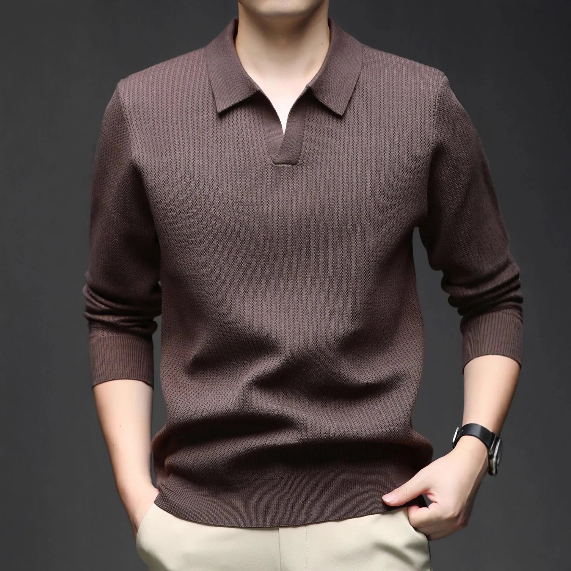 Men's loose fit plain pullover sweater in green, shown on a model for scale.