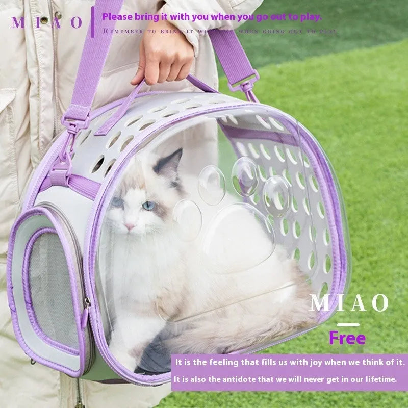 Transparent space capsule cat backpack carrier in grass green colour showing hard EVA construction and dimensions for cats up to 9kg