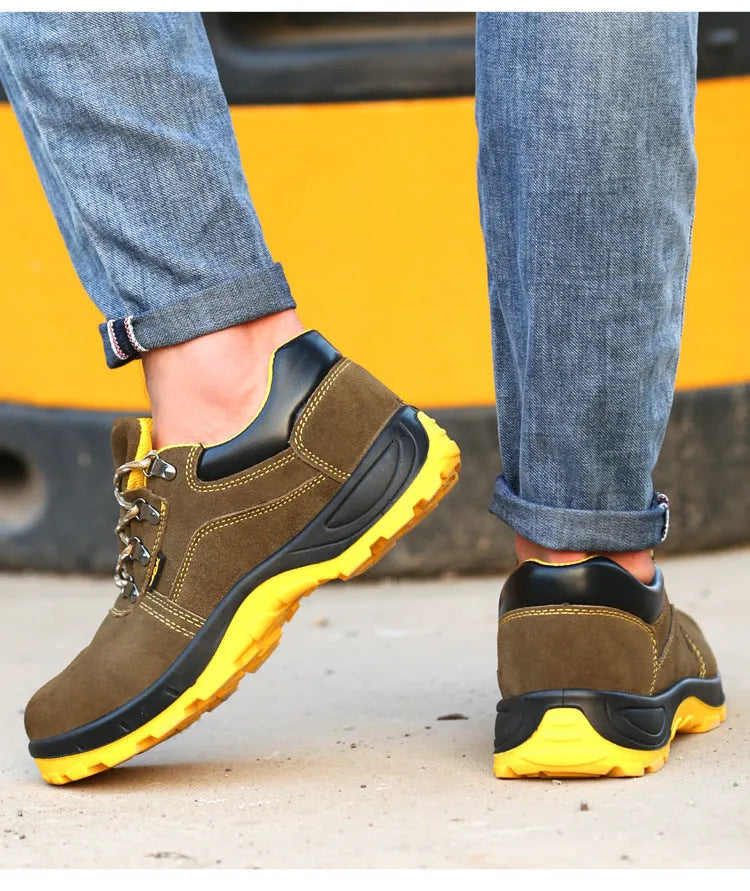 Bronze coloured low-cut steel toe safety boots with a cowhide suede upper and solid rubber sole.