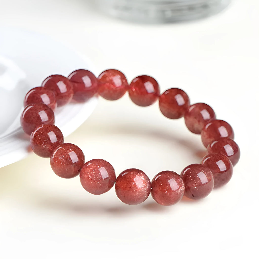 Natural starlight cherry red strawberry quartz bracelet with geometric spherical beads