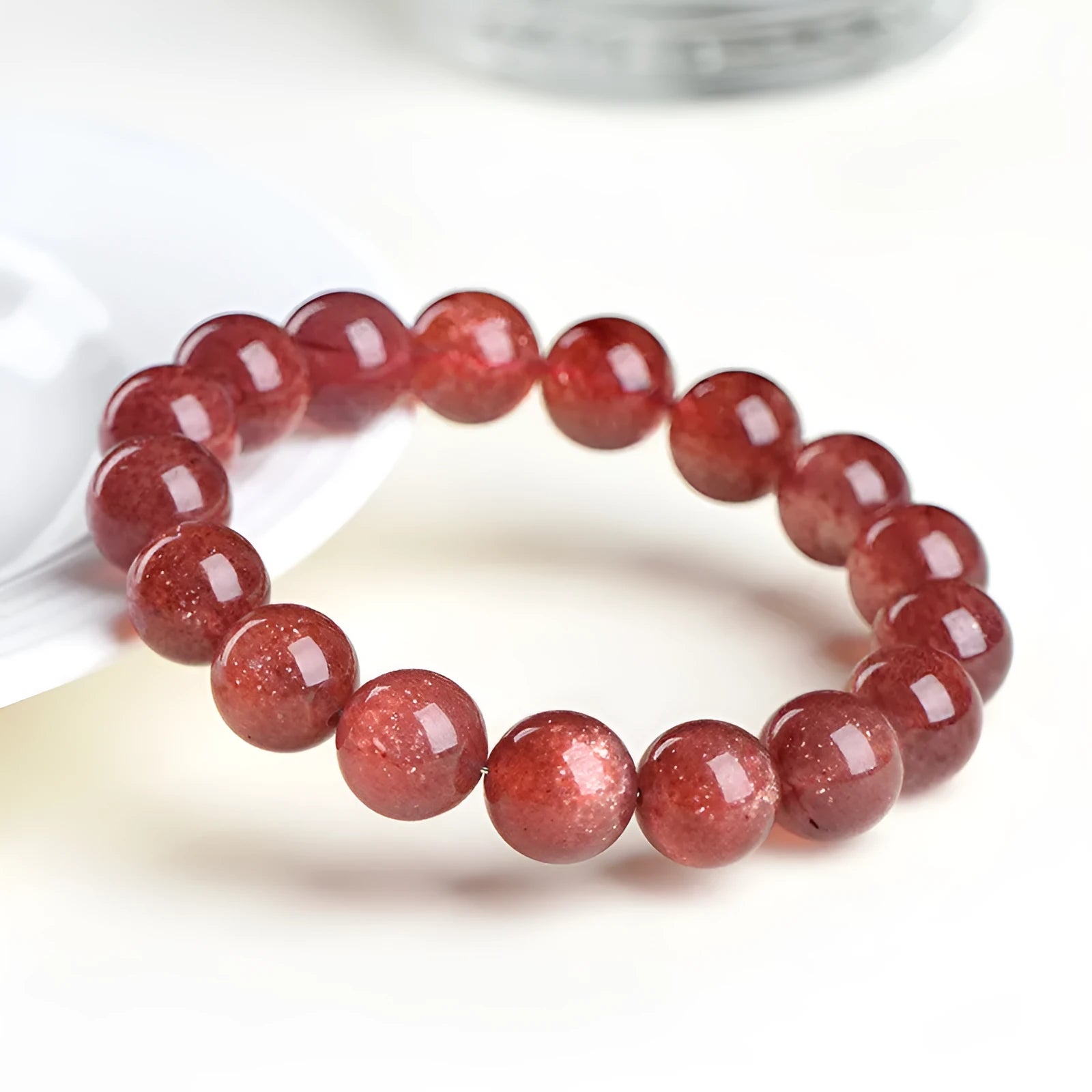 Natural starlight cherry red strawberry quartz bracelet with geometric spherical beads