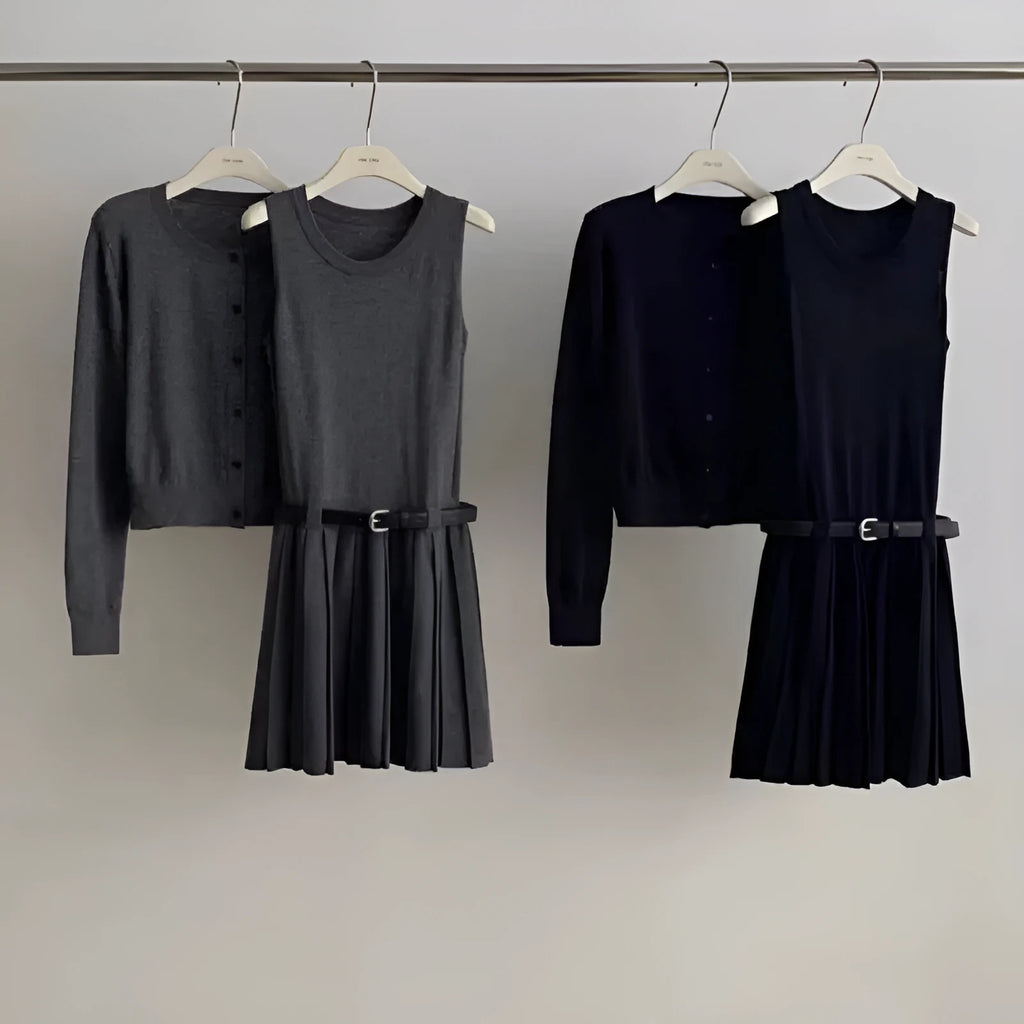 Women's grey knitted two-piece set with vest skirt, long-sleeved cardigan, belt, and 3D pattern detail