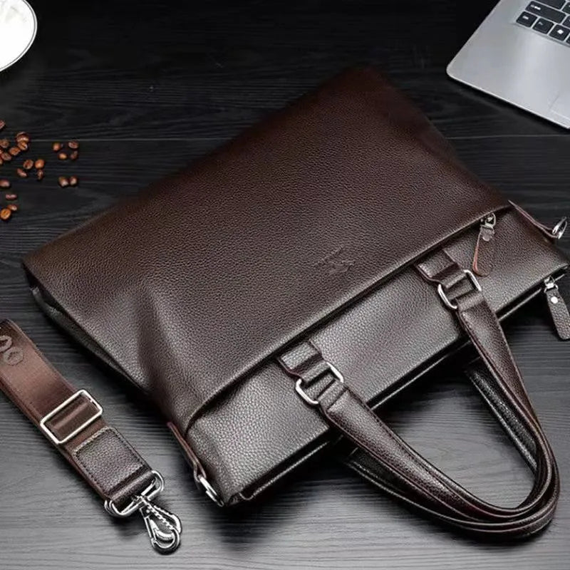 Men's black PU leather messenger bag with crossbody strap and splicing design
