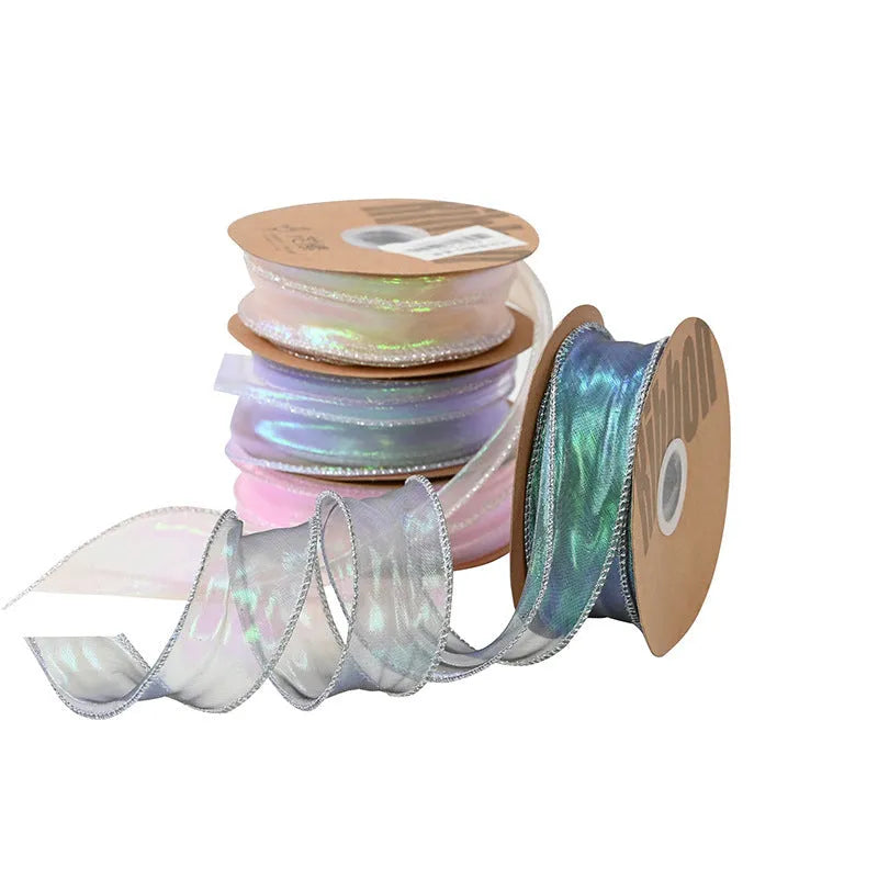 Roll of colourful mesh wave ribbon with fishtail yarn texture in 4cm width