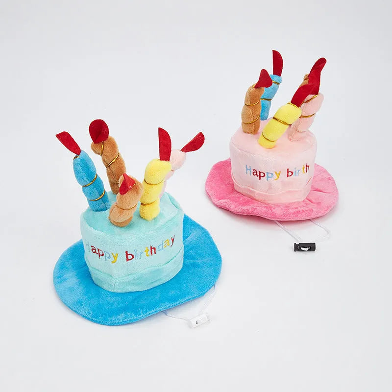 Blue and pink small dog birthday hats for toy breeds on a white background.