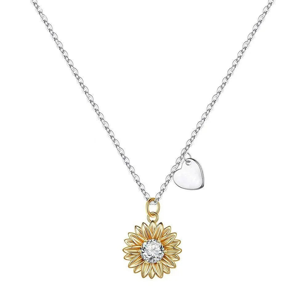 925 silver adjustable sunflower necklace with geometric daisy pendant on a cross chain.