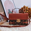 Retro-style square crossbody bag with floral stitching and a diamond pattern in PU leather.
