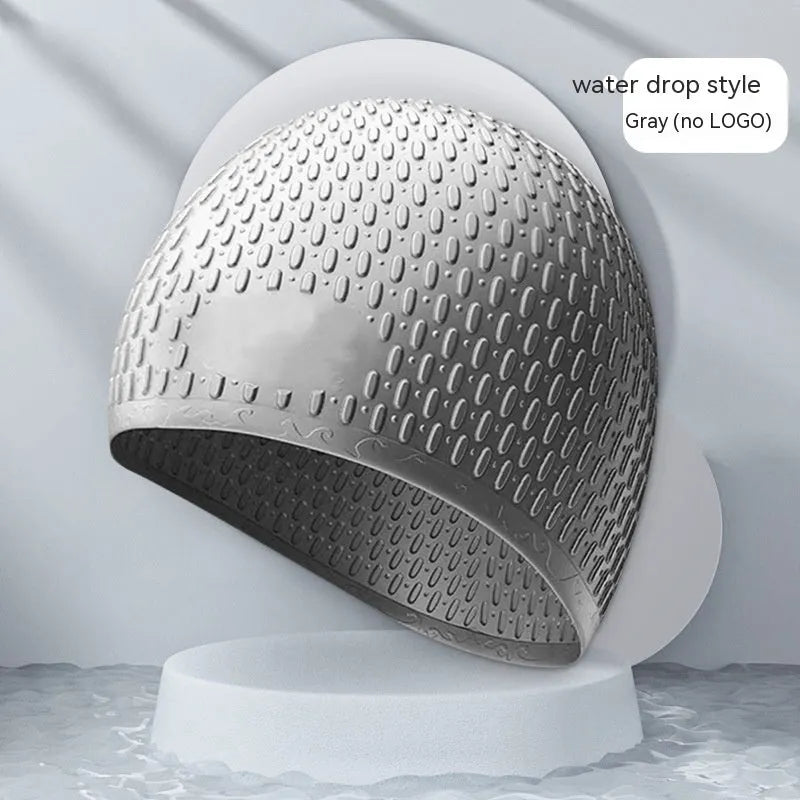 Silicone swimming cap with water drop design in solid colour options