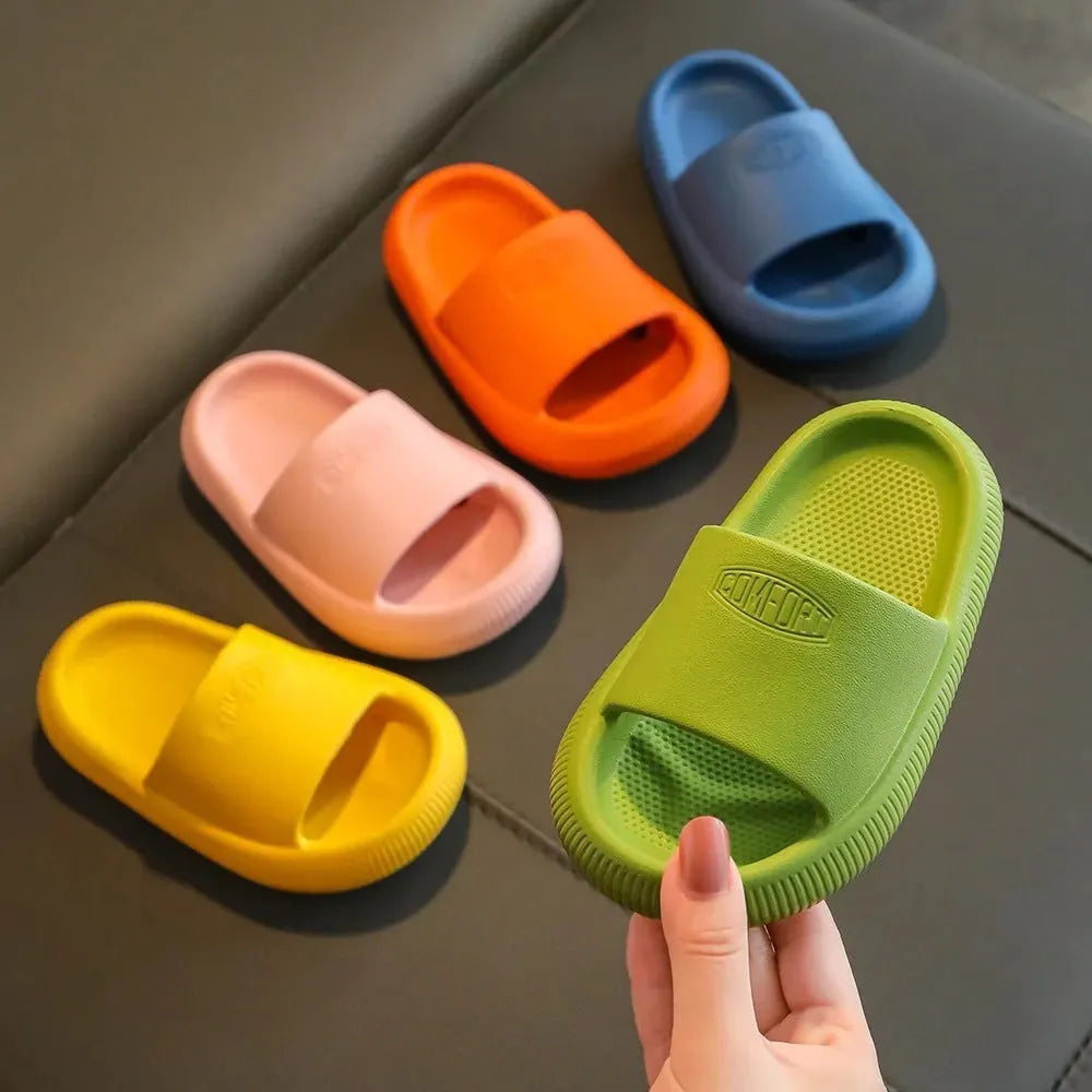 Children's EVA slippers with non-slip soles in mixed colour options showing size range