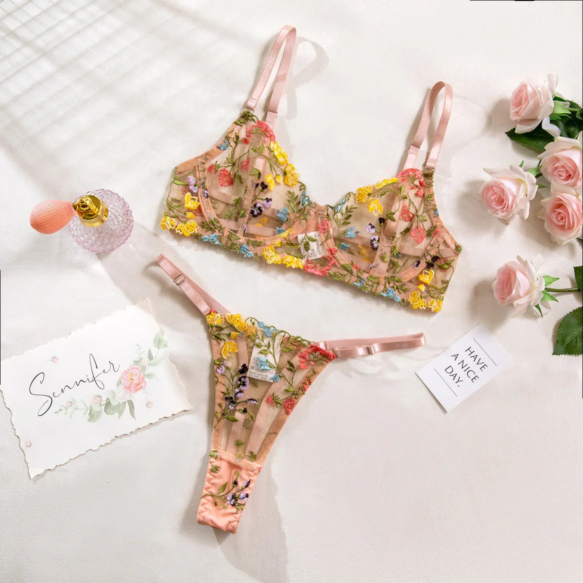 Traditional floral 3/4 cup mesh bra with steel ring and matching T-back underwear in skin colour.