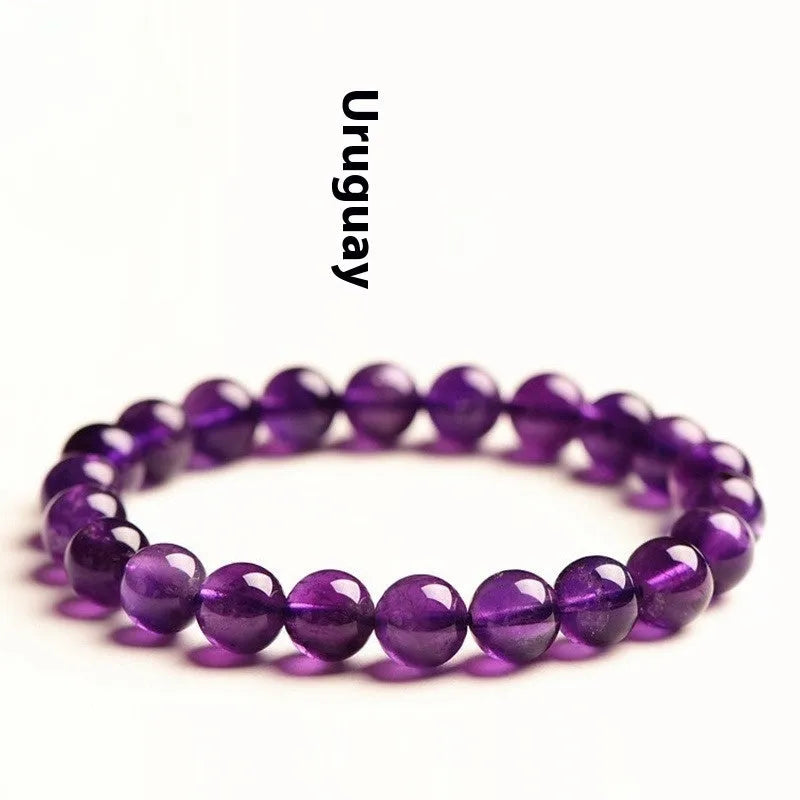 Natural amethyst bracelet with scattered Uruguay beads in selectable sizes and colour grades.