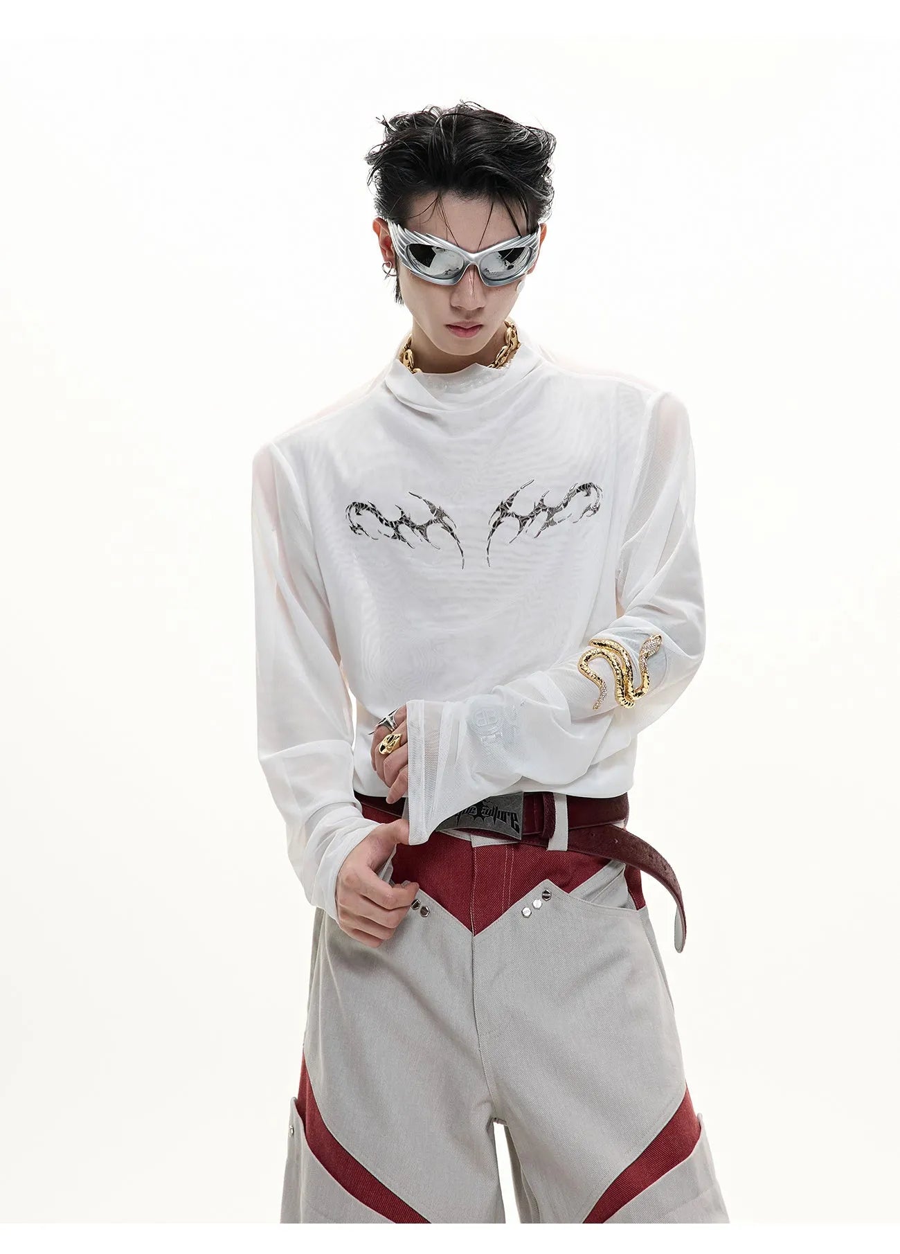 Men's black slim-fit mesh long-sleeve bottoming shirt laid flat, showing texture.