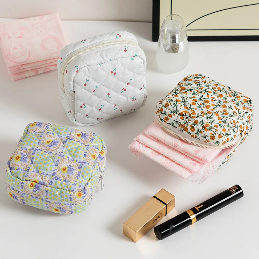 Floral polyester key storage bag with sewing thread detailing in multiple colour patterns