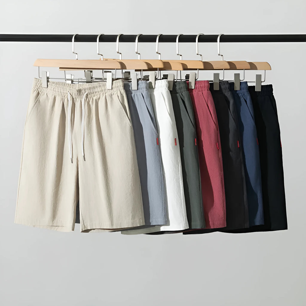 Solid colour cotton linen cropped summer pants with a drawstring waist on a hanger.