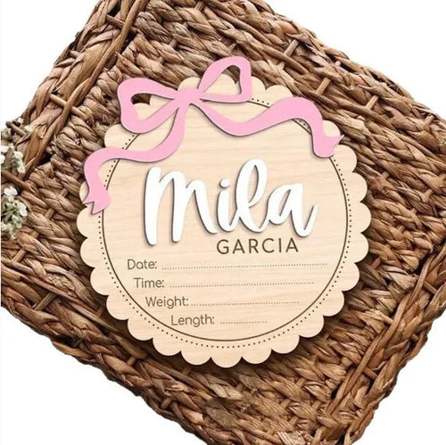 Square wooden ornament laser-engraved with a custom name for baby room decoration.