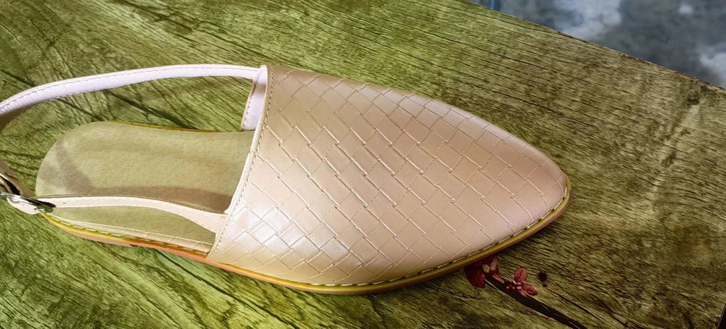 Women's buckle flat sandals with pointed toe in multiple colour options showing adjustable strap