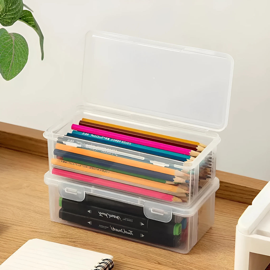 Clear plastic large capacity pencil storage box filled with coloured pencils and art supplies