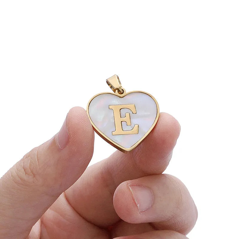 Gold plated personalised heart necklace with white shell on a 45cm chain