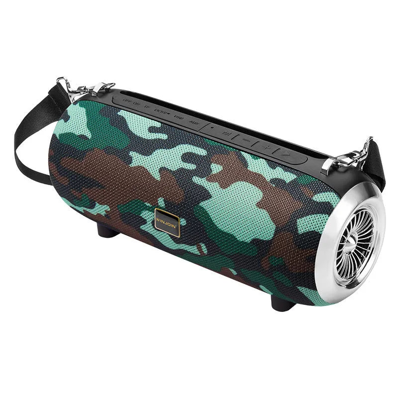 F666 portable Bluetooth speaker in mesh plastic case with shoulder strap, shown next to a mobile phone.