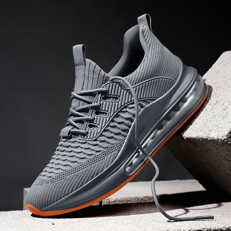 Men's black mesh running shoes with platform sole and round toe design on white background