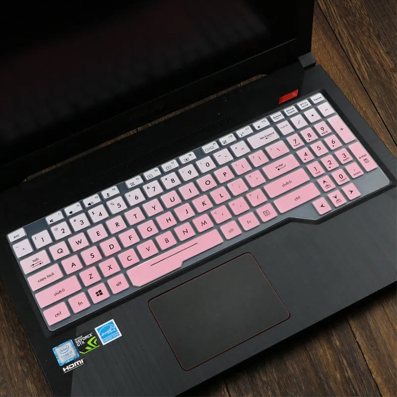 Transparent silicone keyboard protective film for ASUS Flight laptop on a keyboard.
