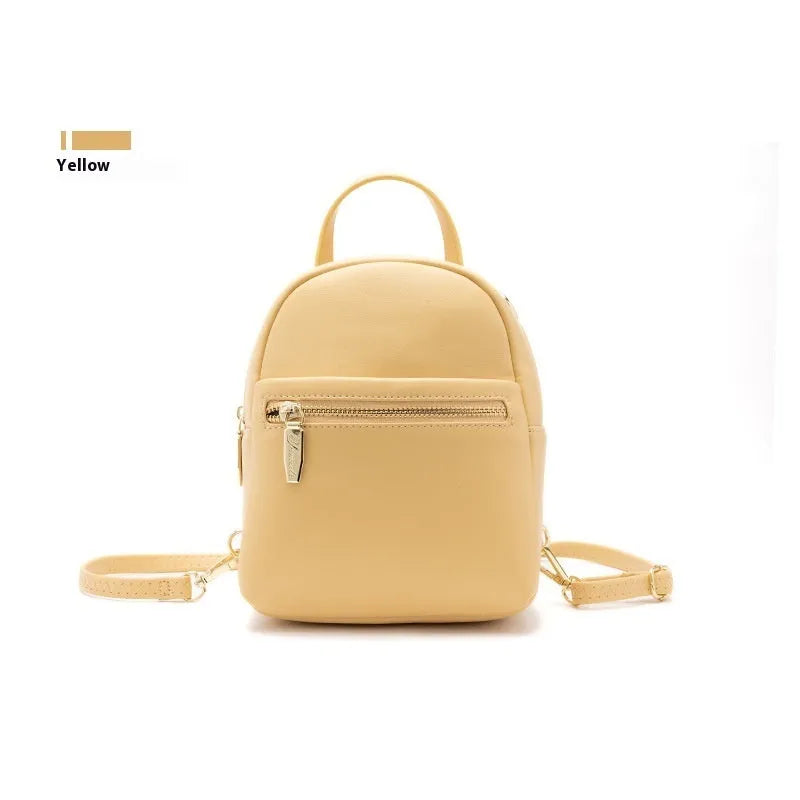 Soft PU mini backpack in multiple colours showing outer pocket and street style design