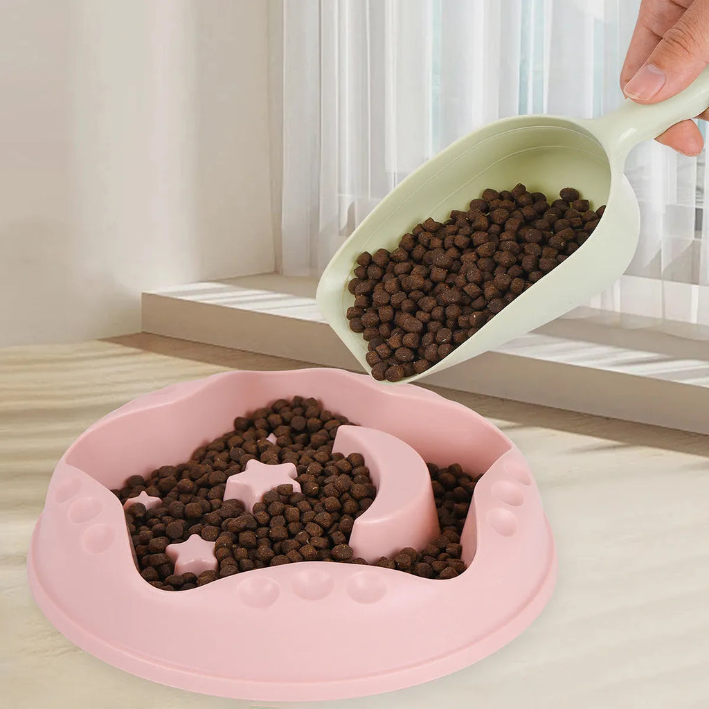 Moon Star Wings slow feed dog bowl with interior ridges and non-slip base in assorted colours.