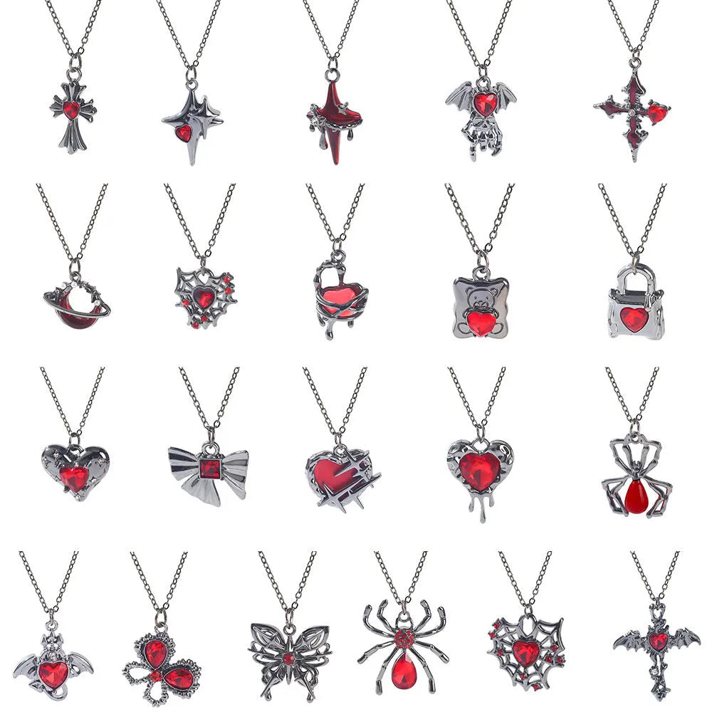 Gothic Halloween necklace with spider and bat alloy pendant on a chain.