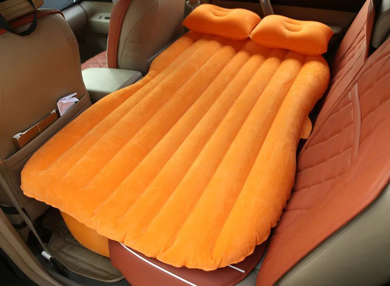 Thick flocking inflatable car air bed set with pump and pillows for five-seater vehicles.