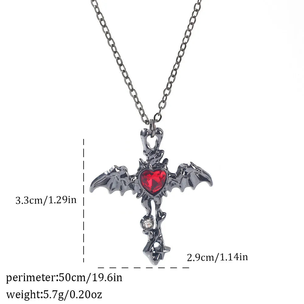 Gothic Halloween necklace with spider and bat alloy pendant on a chain.
