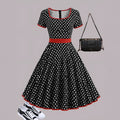 Multicolour polka dot pleated midi dress with a square collar, short sleeves, and a front zipper.