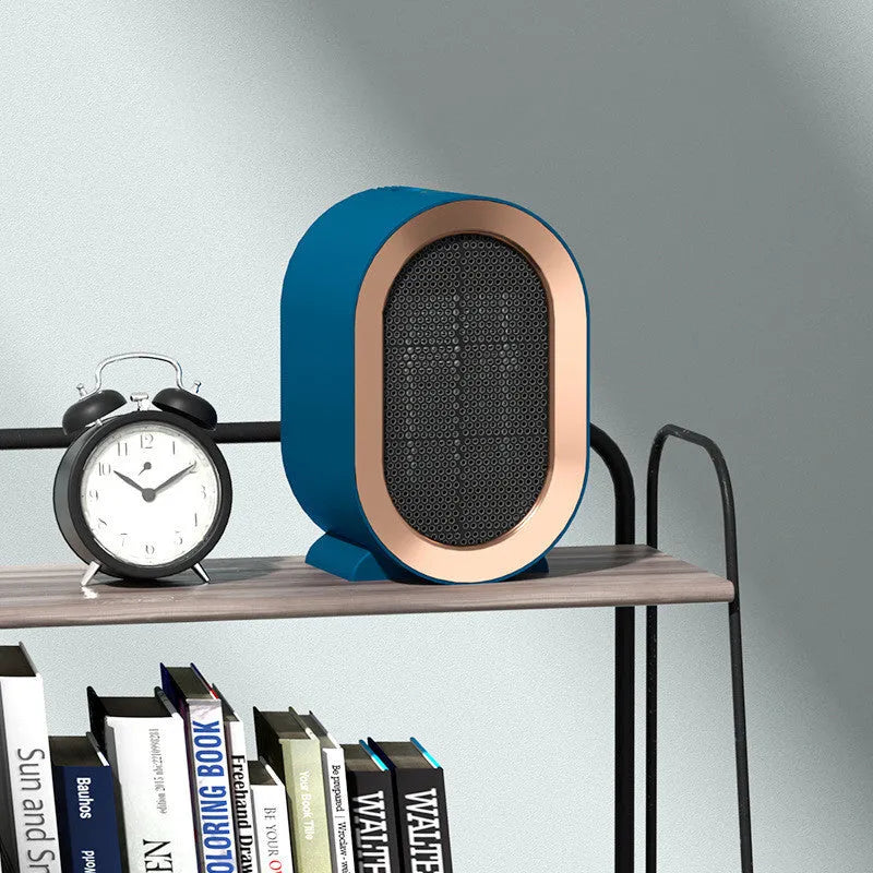 Desktop portable electric heater with PTC ceramic heating element and mechanical controls